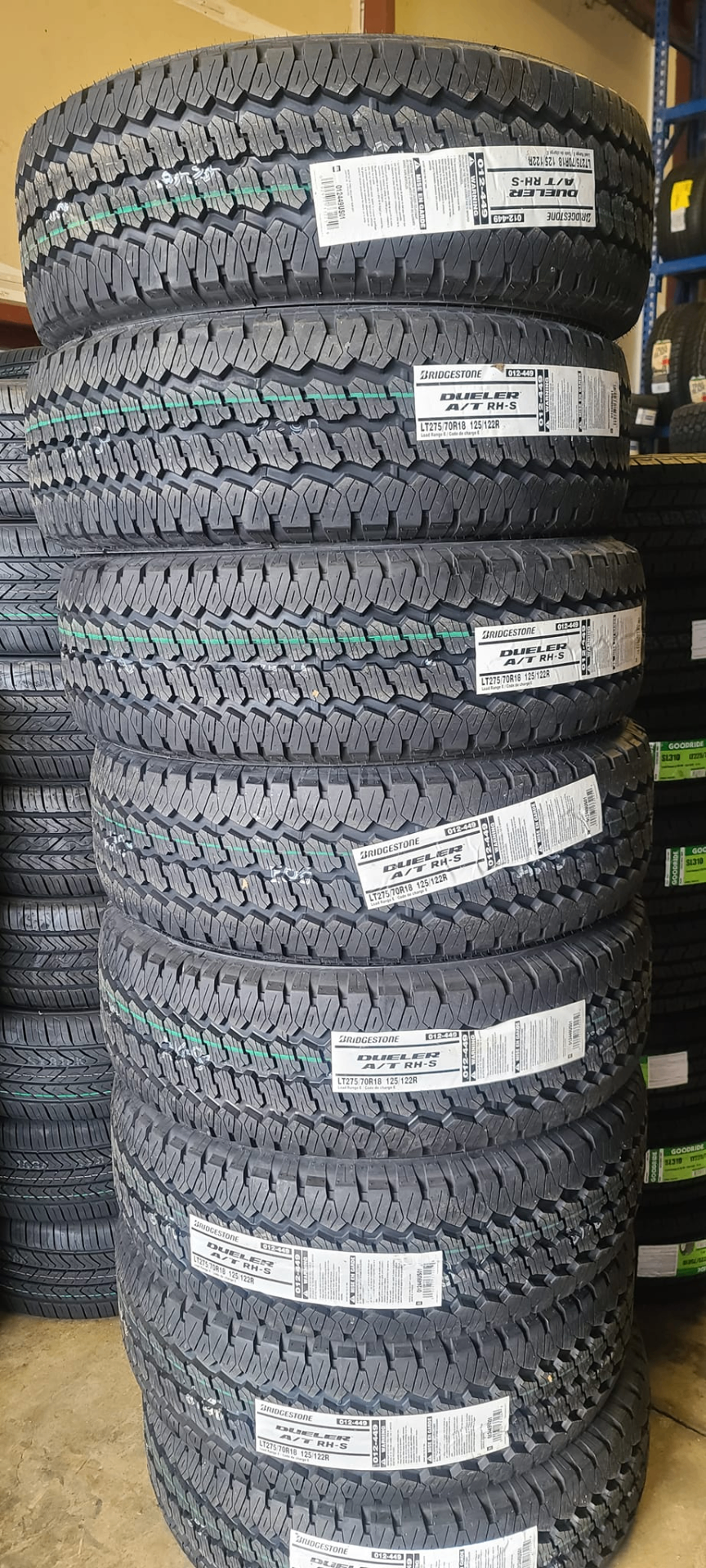 Stack of Bridgestone Dueler all-terrain tires